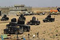 إشتباكات في كركوك والقوات العراقية تسيطر على بعض المواقع