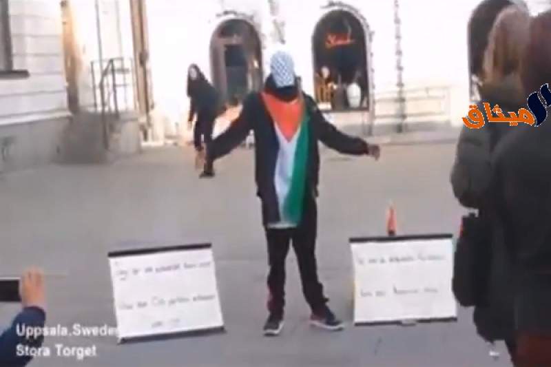 بالفيديو:فتى فلسطيني يكتب:&quot;وطني محتل والعالم لا يعترف بي .. فهل تعترف أنت ؟ &quot; ..شاهد ردة الفعل