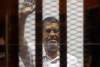    حضور إعلامي مكثف لتغطية جلسة النطق بالحكم على مرسي في &quot;التخابر مع قطر&quot;